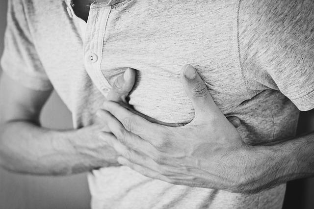 Man having chest pain as a symptom of asbestos exposure