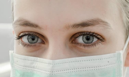 Woman wears medical mask
